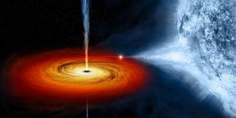 Телескоп ʺХабблʺ сфотографировал, как черная дыра всасывает в воронку сверхмощные звезды и их окружение 