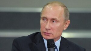 Владимир Путин в храме Живоначальной троицы поставил свечки за "защитников Новороссии"